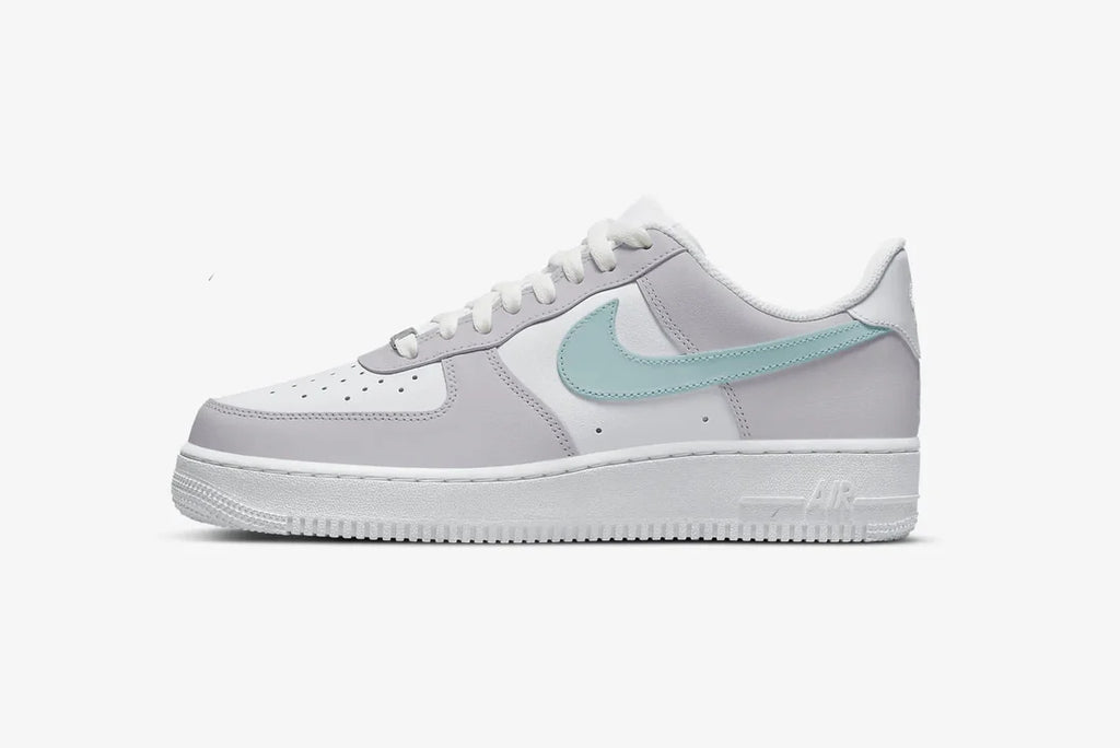 Customizing Nike Air Force 1: The Perfect Blend of Blue Swoosh and Light Grey Upper